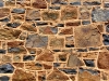 Rock art of a different kind.  Detail of wall, old general store, Cossack